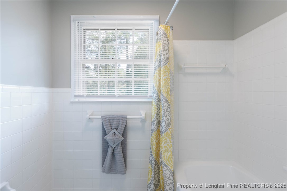 2419 Morganton Road Fayetteville, NC 28303 - Photo 25 of 44 a bathroom with a shower