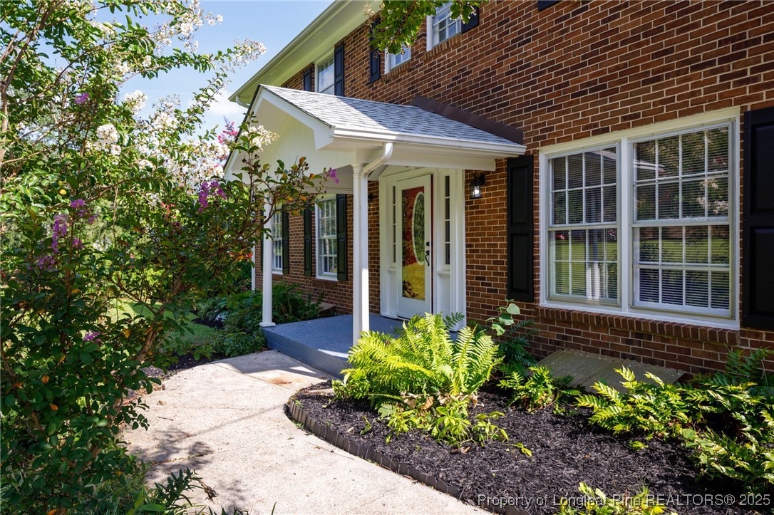 2419 Morganton Road Fayetteville, NC 28303 - Photo 3 of 44 a view of a house with potted plants
