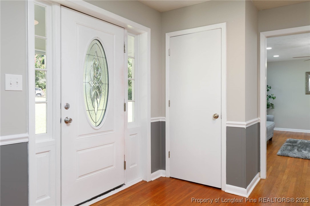 2419 Morganton Road Fayetteville, NC 28303 - Photo 4 of 44 a view of a hallway with wooden floor and entryway
