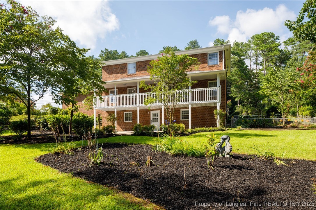 2419 Morganton Road Fayetteville, NC 28303 - Photo 44 of 44 a front view of a house with a yard