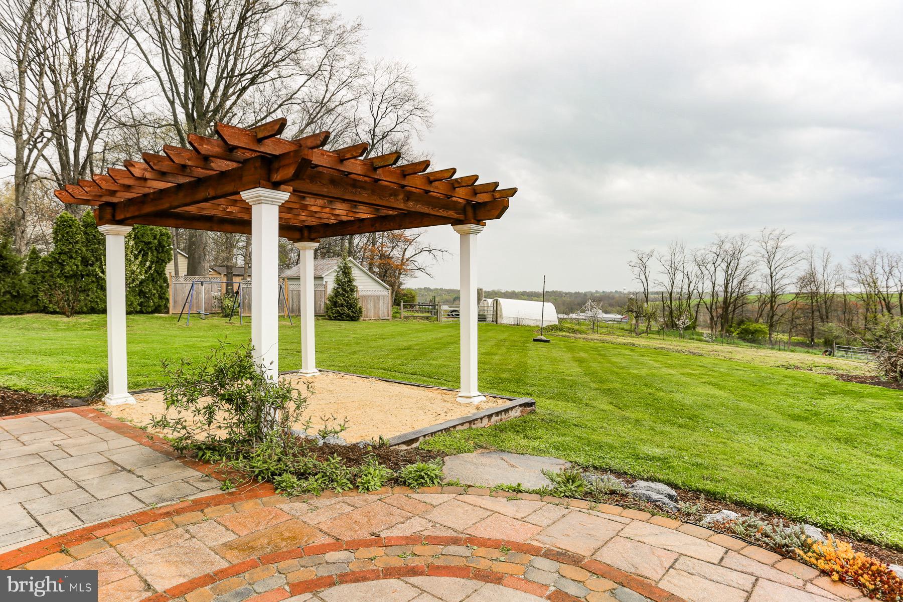 3817 Elizabethtown Road Manheim, PA 17545 - Photo 43 of 70 a view of a garden with an outdoor space