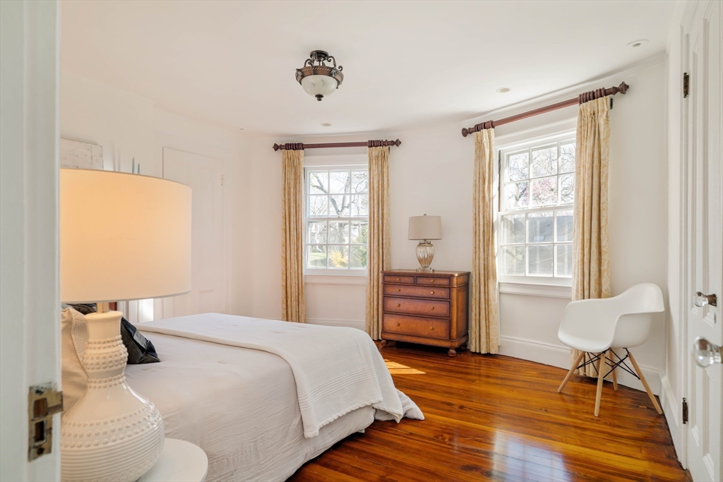 10 Rangeley Road Winchester, MA 01890 - Photo 24 of 42 a bedroom with a bed and wooden floor