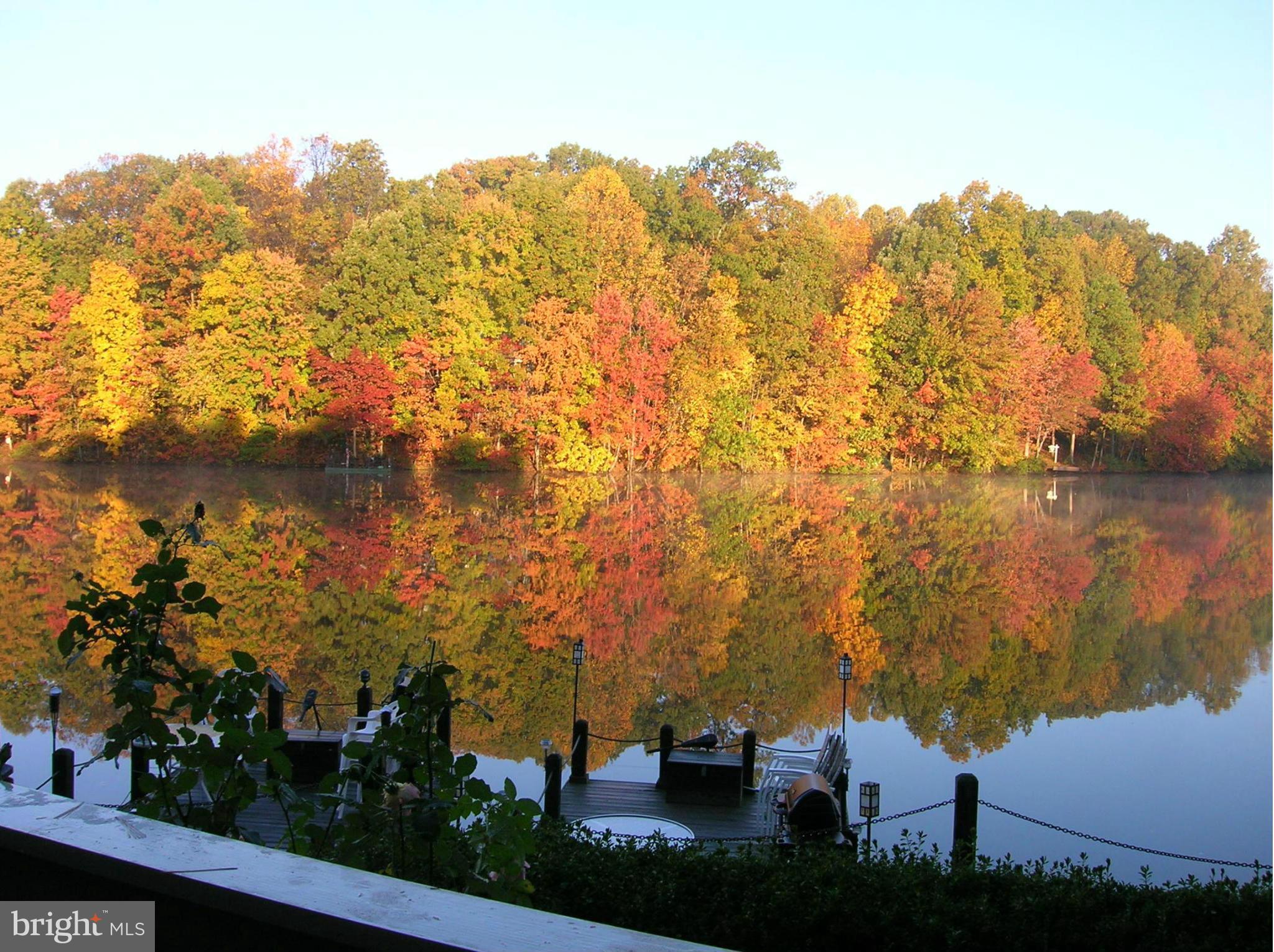 11286 Harbor Court, Unit 11286 Reston, VA 20191 - Photo 1 of 27 a view of lake and mountain