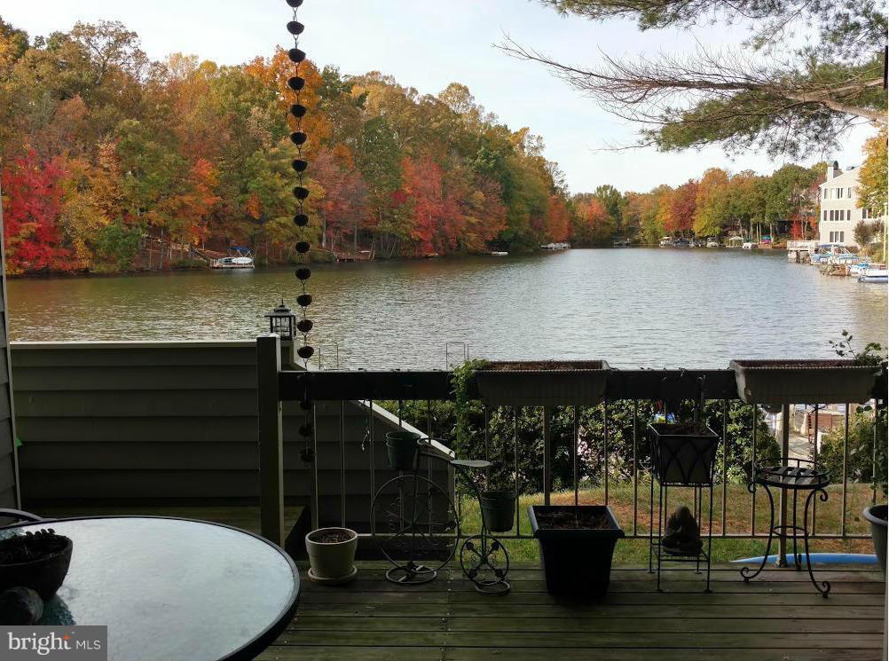 11286 Harbor Court, Unit 11286 Reston, VA 20191 - Photo 23 of 27 a view of house with backyard and seating space