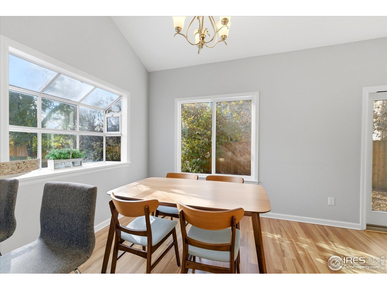 1812 Rice Street Longmont, CO 80501 - Photo 12 of 44 a view of a dining room with furniture window and outside view