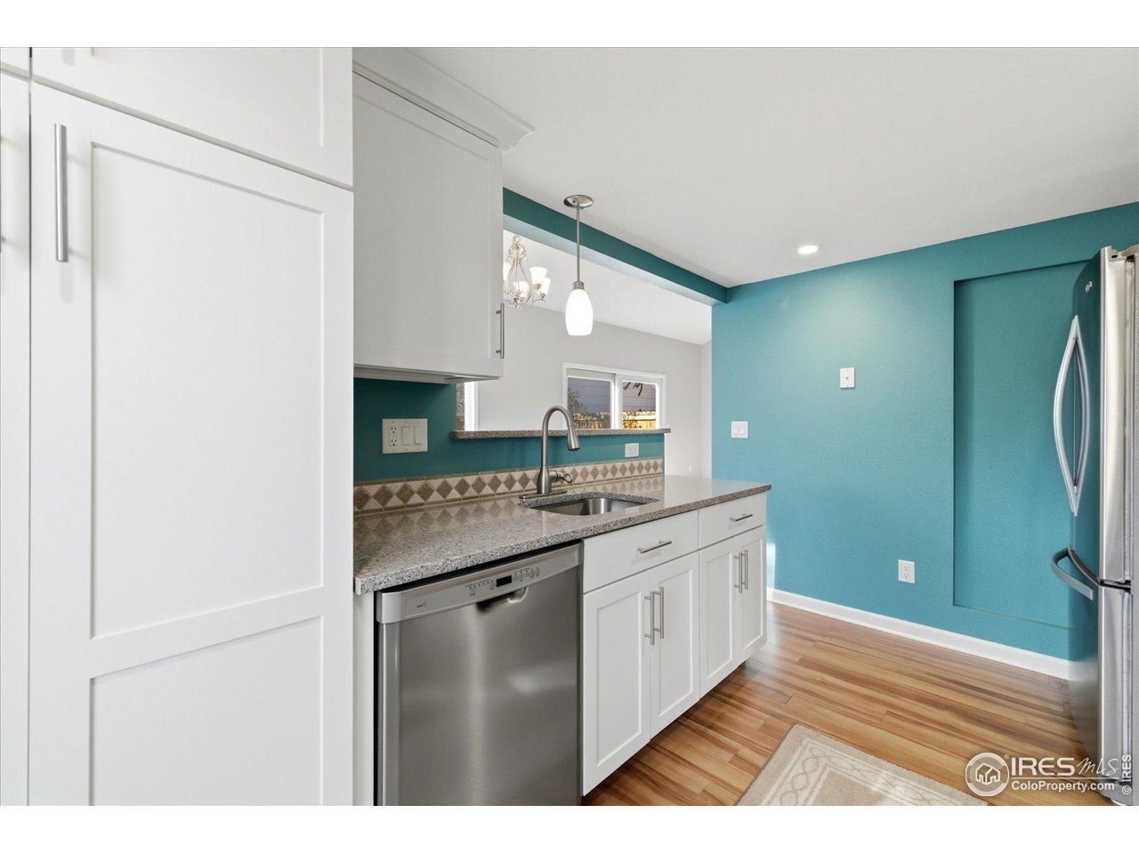 1812 Rice Street Longmont, CO 80501 - Photo 15 of 44 a bathroom with a double vanity sink and a mirror
