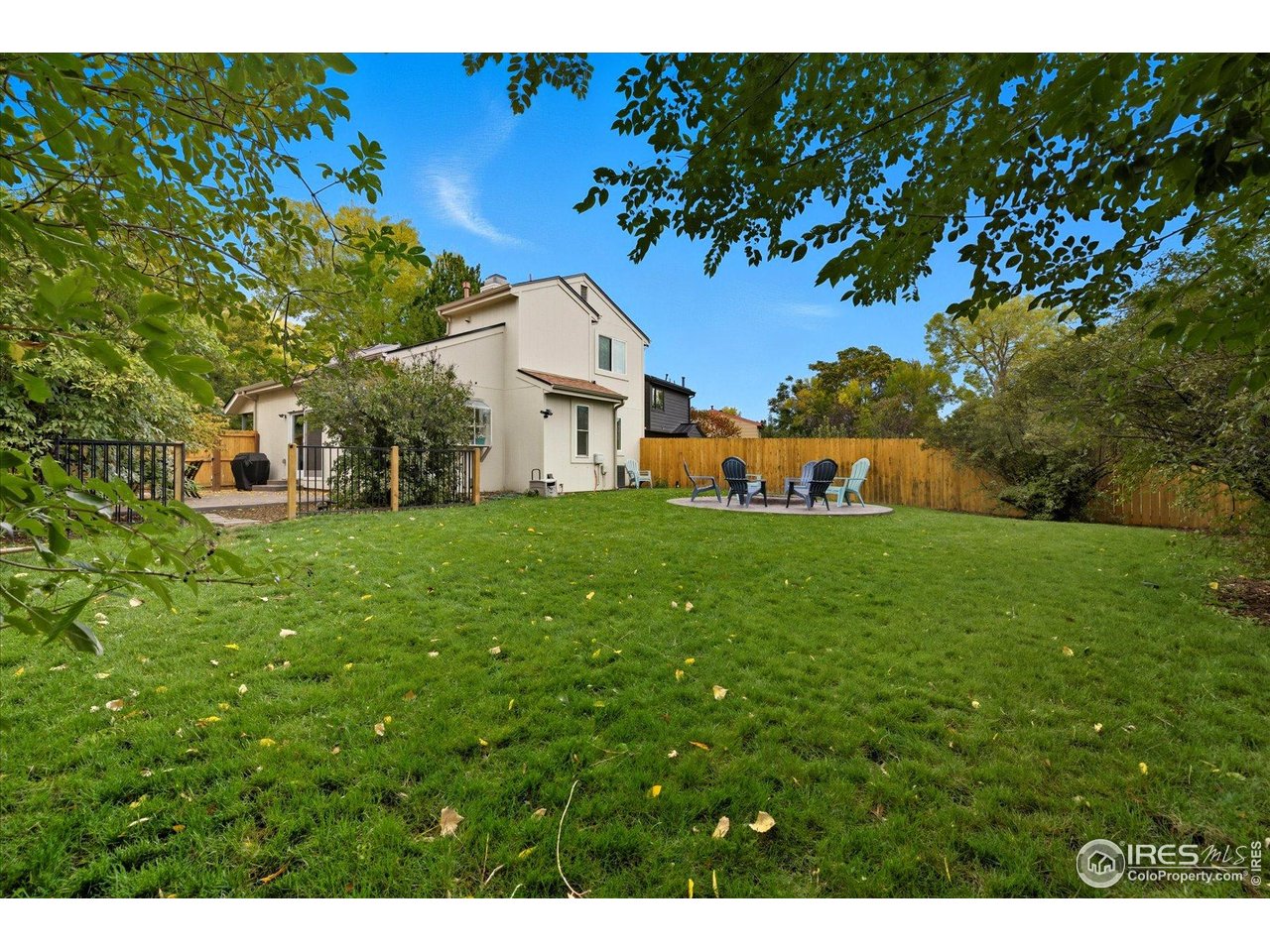 1812 Rice Street Longmont, CO 80501 - Photo 37 of 44 a view of a house with a yard