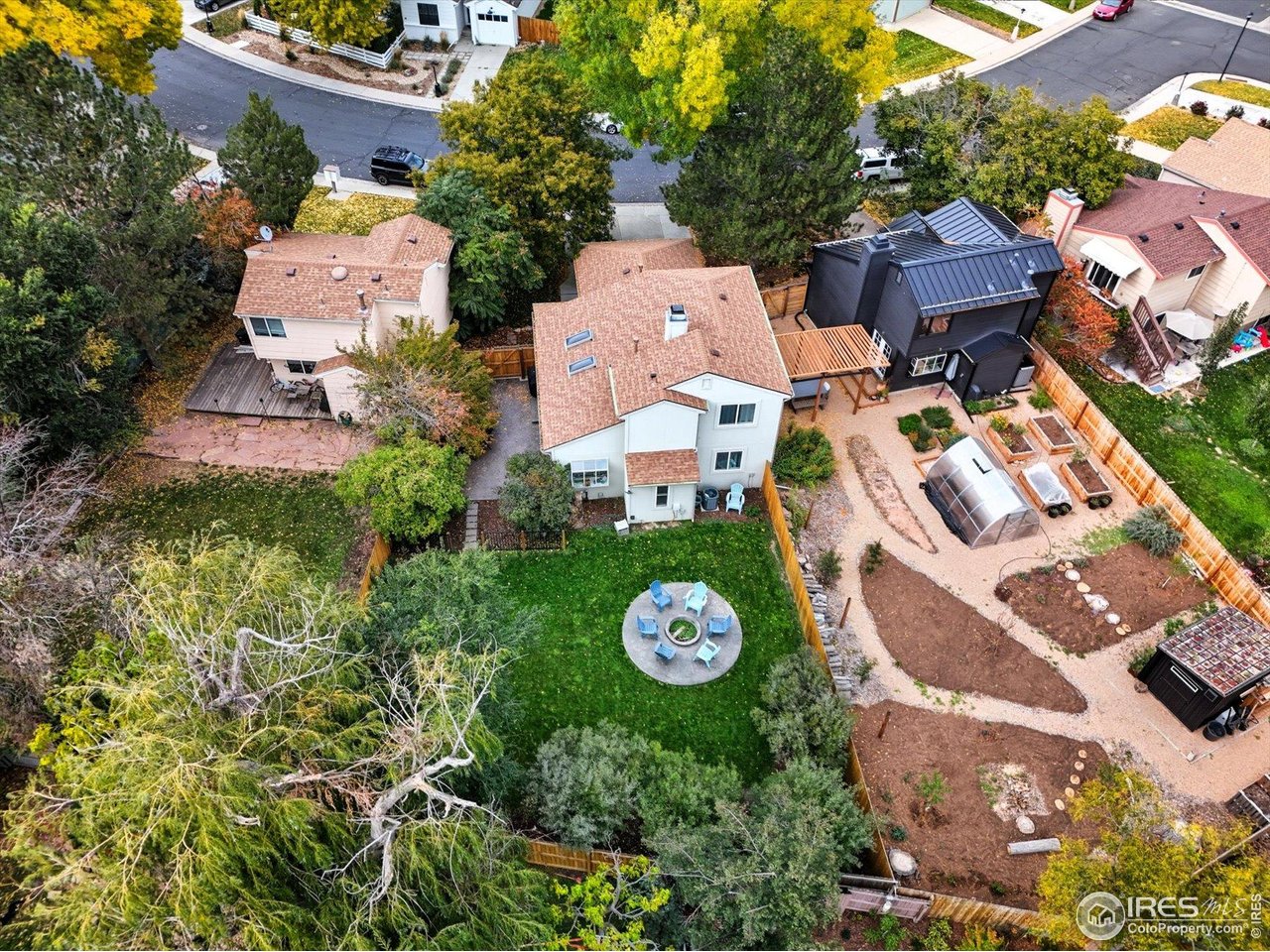 1812 Rice Street Longmont, CO 80501 - Photo 39 of 44 an aerial view of a house with a garden