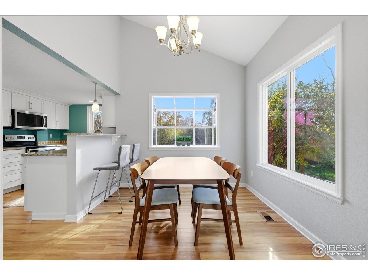 1812 Rice Street Longmont, CO 80501 - Photo 10 of 44 a outdoor dining space with furniture and window