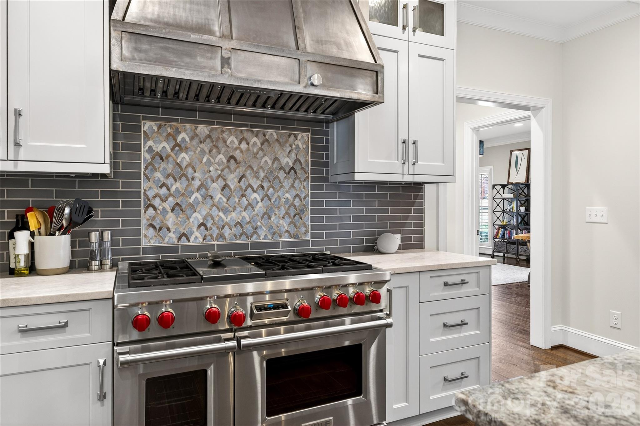 3025 Foxridge Road Charlotte, NC 28226 - Photo 12 of 48 a kitchen with stainless steel appliances granite countertop a stove and a sink