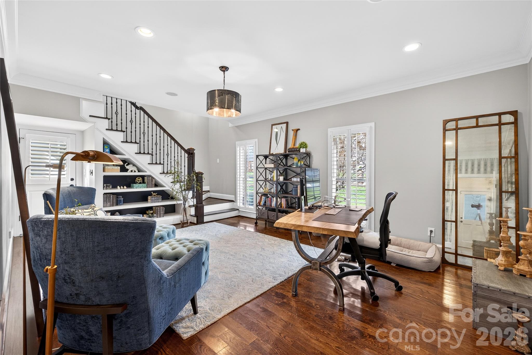 3025 Foxridge Road Charlotte, NC 28226 - Photo 22 of 48 a view of a livingroom with furniture and a workspace