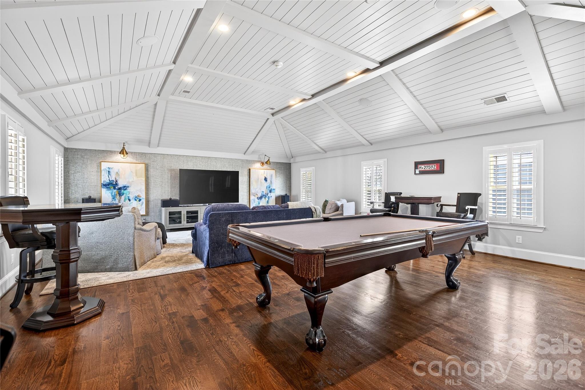 3025 Foxridge Road Charlotte, NC 28226 - Photo 26 of 48 a room with pool table windows and wooden floor