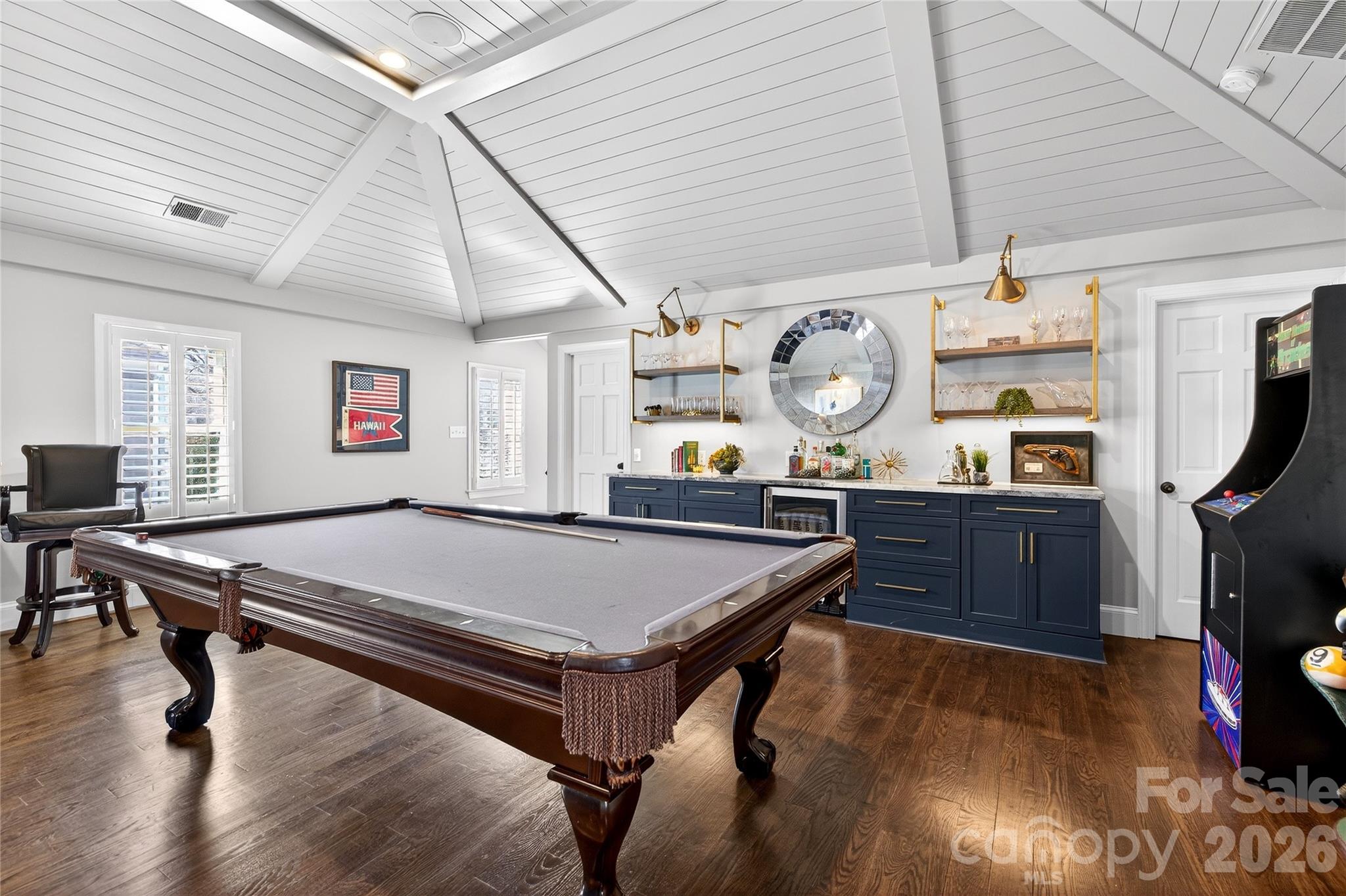 3025 Foxridge Road Charlotte, NC 28226 - Photo 27 of 48 a room with table chairs and wooden floor