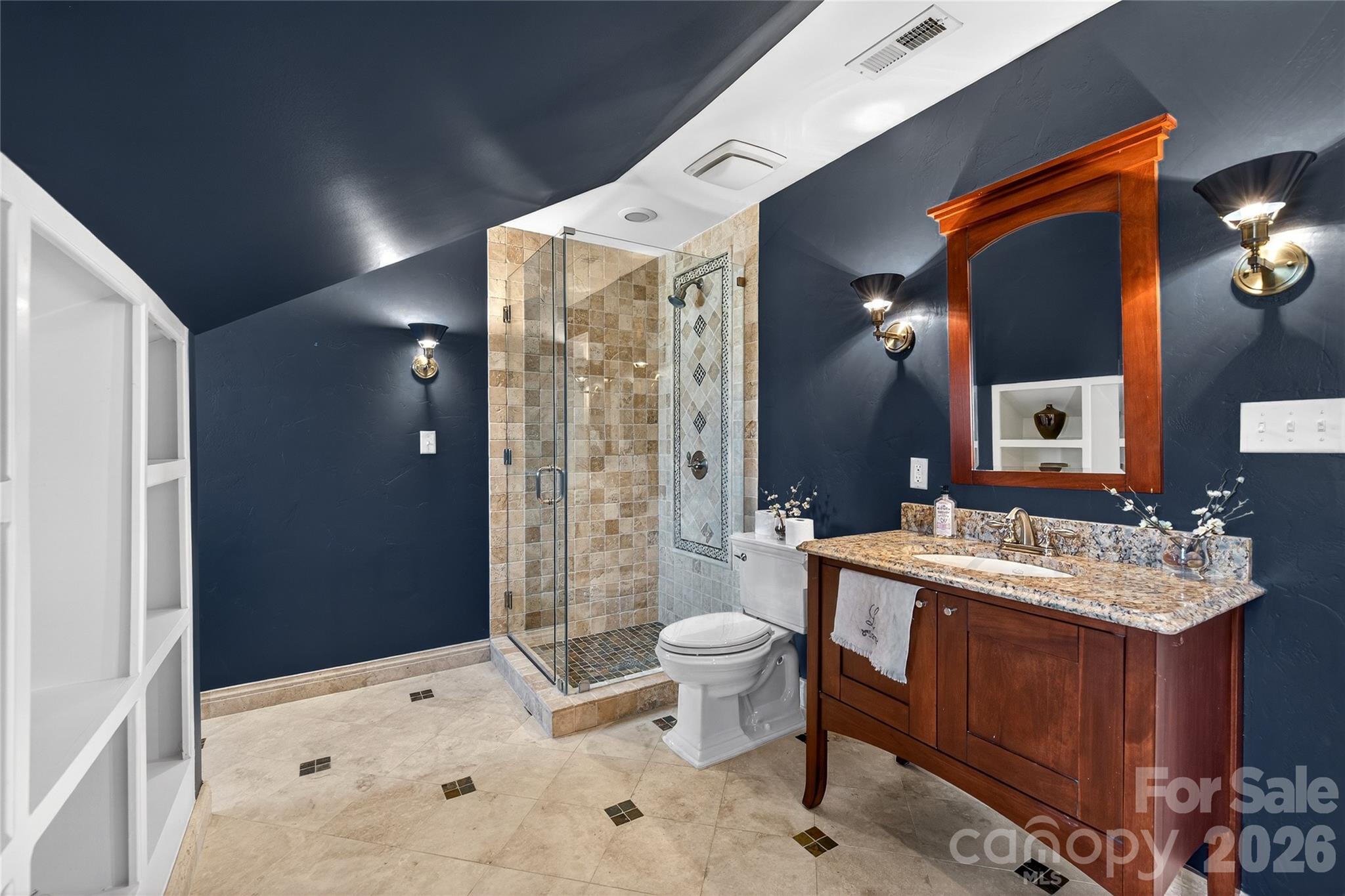 3025 Foxridge Road Charlotte, NC 28226 - Photo 30 of 48 a spacious bathroom with a sink and a mirror