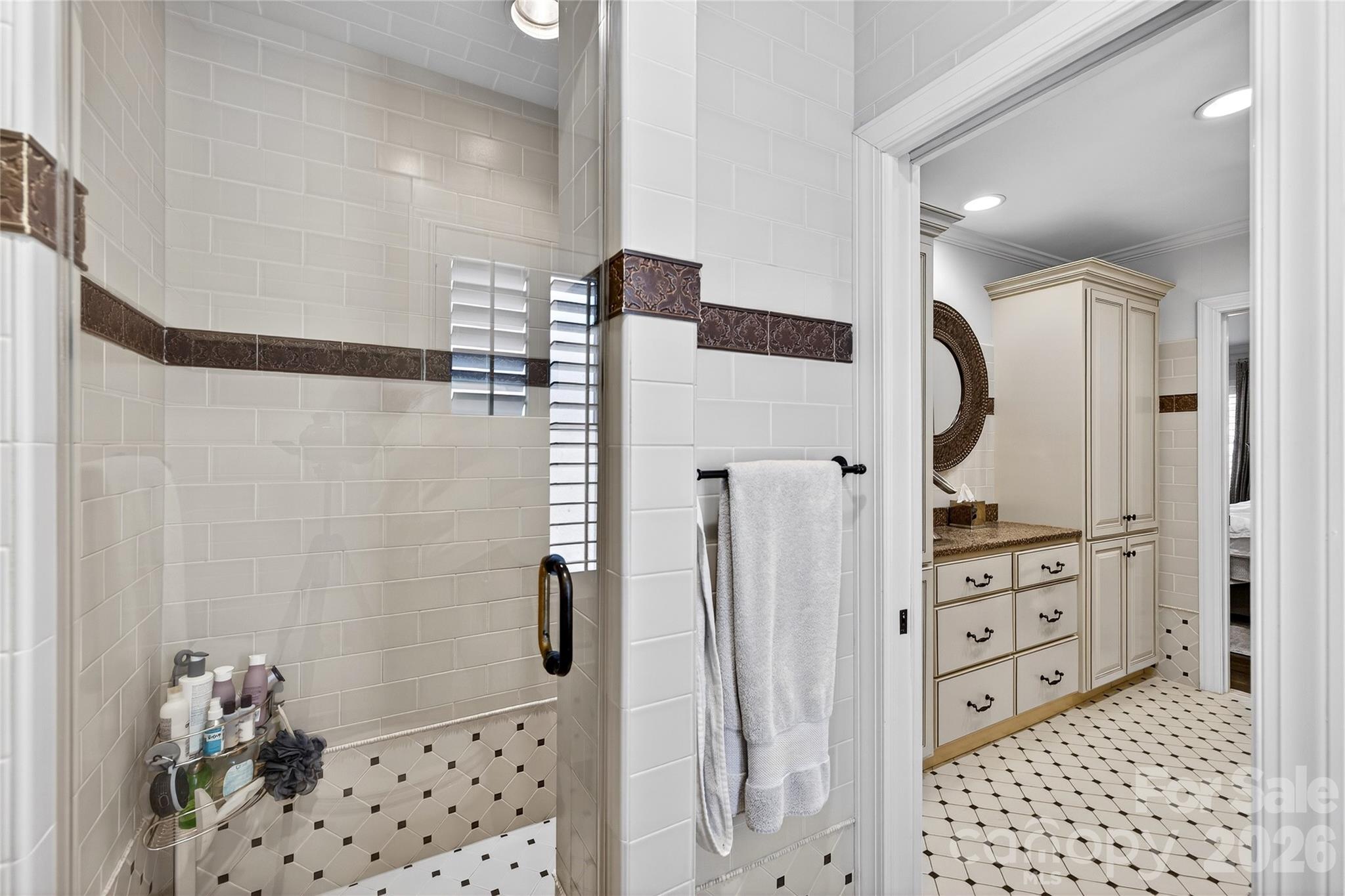 3025 Foxridge Road Charlotte, NC 28226 - Photo 35 of 48 a bathroom with a shower