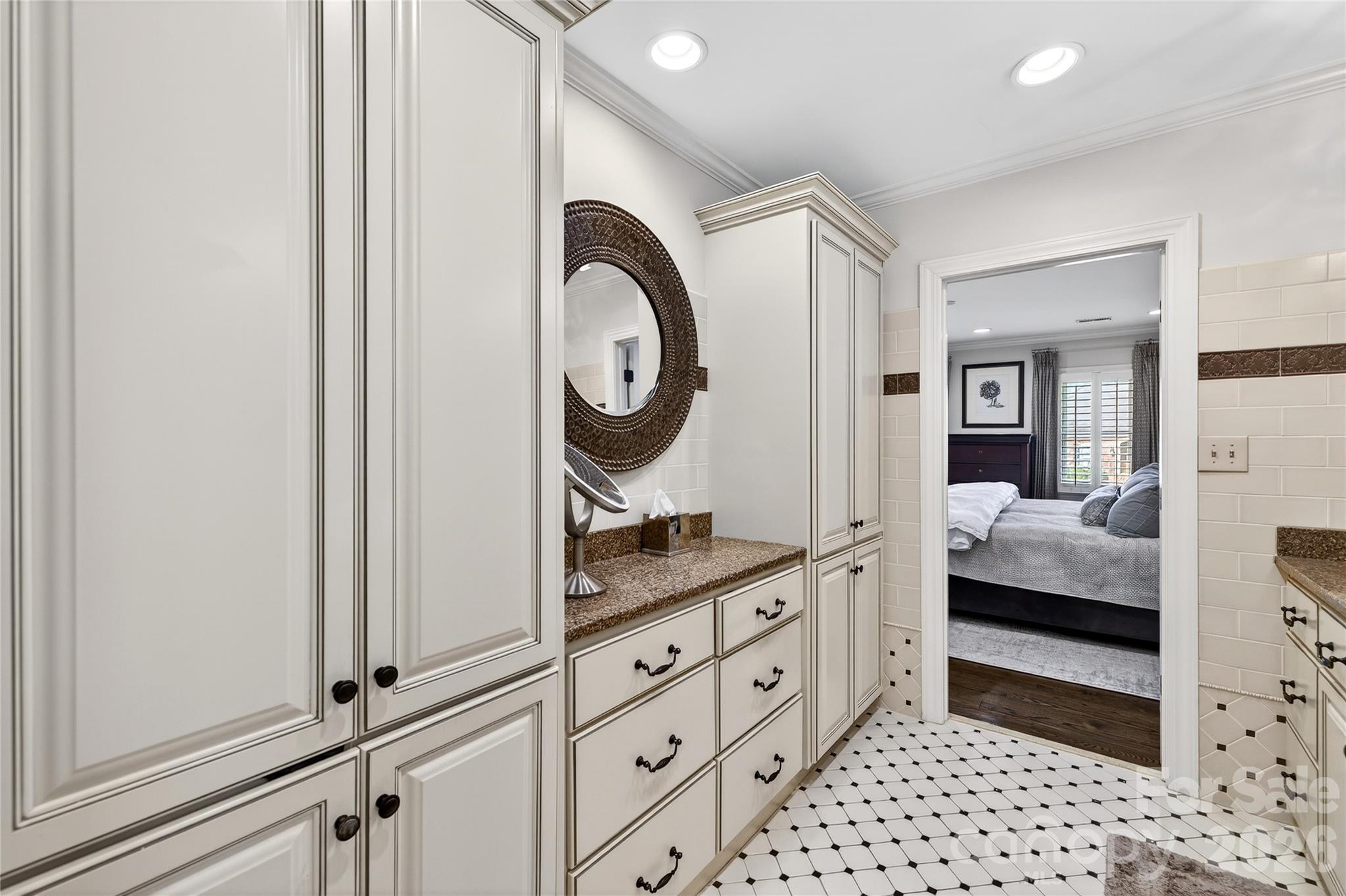 3025 Foxridge Road Charlotte, NC 28226 - Photo 36 of 48 a bedroom with a bed and a closet