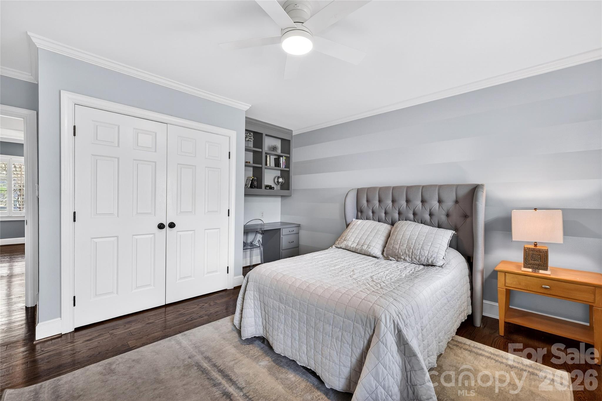 3025 Foxridge Road Charlotte, NC 28226 - Photo 41 of 48 a bedroom with a bed and a night stand