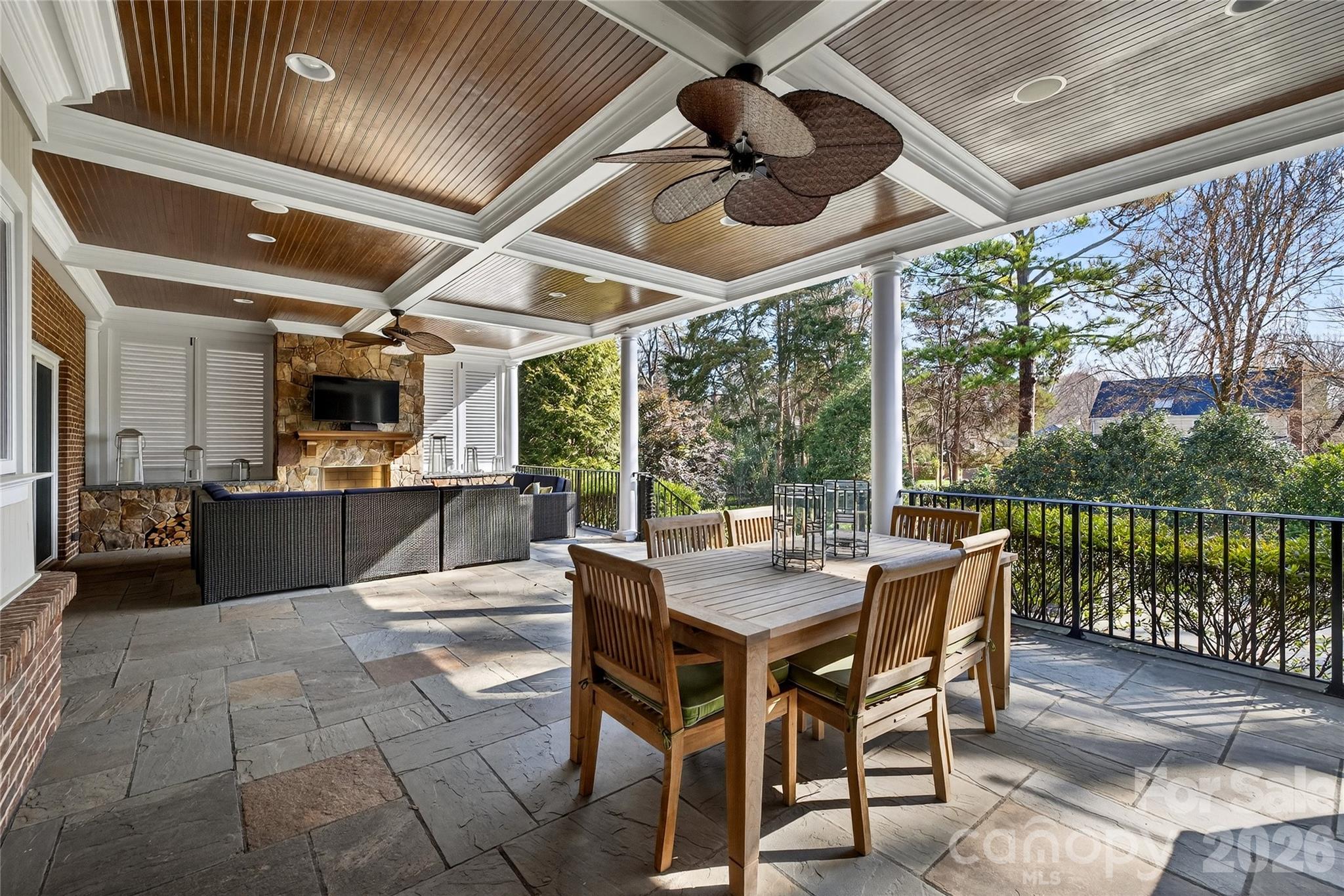 3025 Foxridge Road Charlotte, NC 28226 - Photo 44 of 48 a view of a patio with a table and chairs