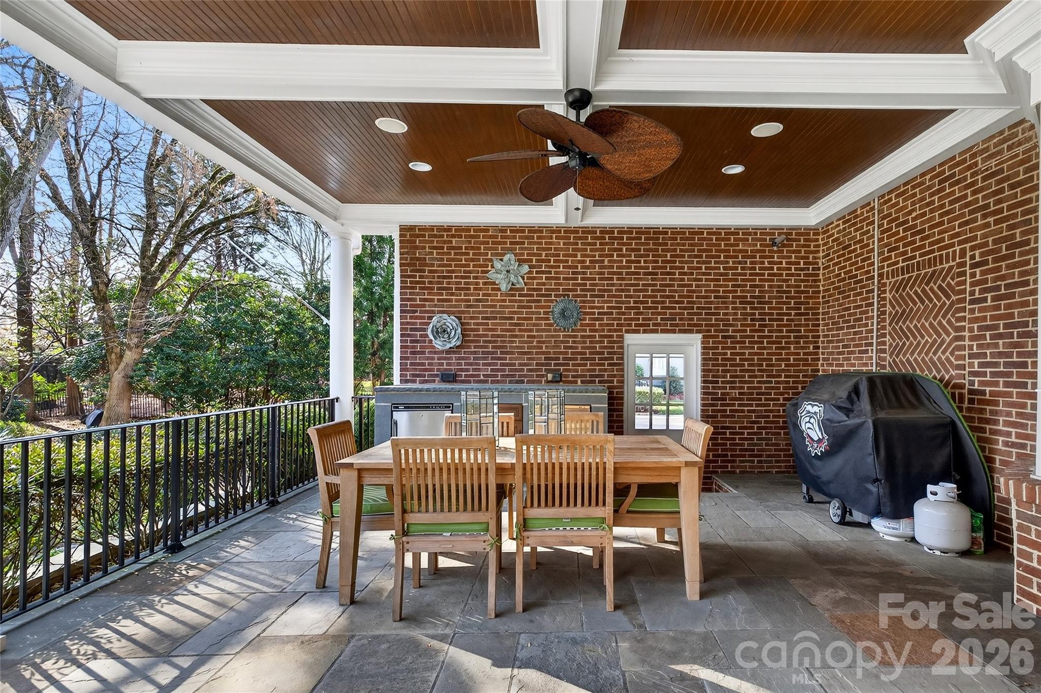 3025 Foxridge Road Charlotte, NC 28226 - Photo 47 of 48 a view of a patio with a table and chairs