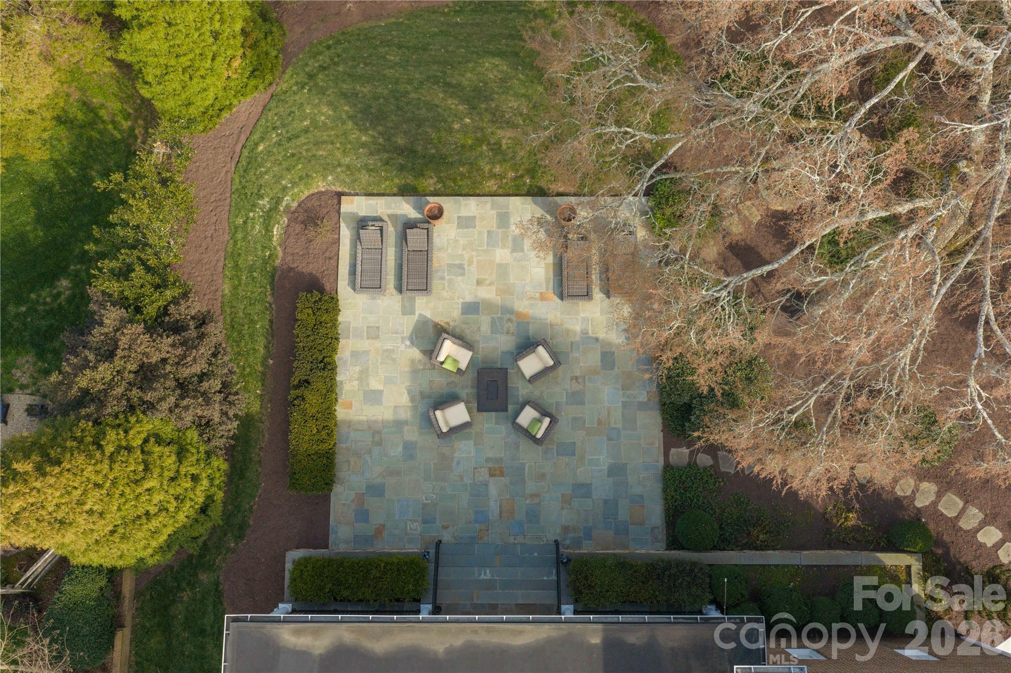 3025 Foxridge Road Charlotte, NC 28226 - Photo 48 of 48 view of a brick house with a yard