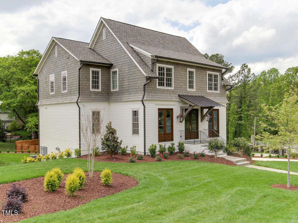 3311 Lake Boone Trail Raleigh, NC 27607 - Photo 1 of 24 front view of a house with a yard