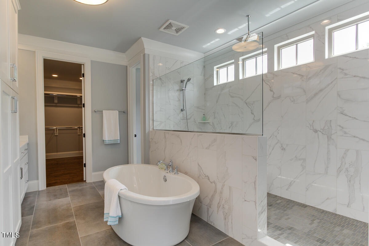 3311 Lake Boone Trail Raleigh, NC 27607 - Photo 16 of 24 a bathroom with a sink and a bathtub