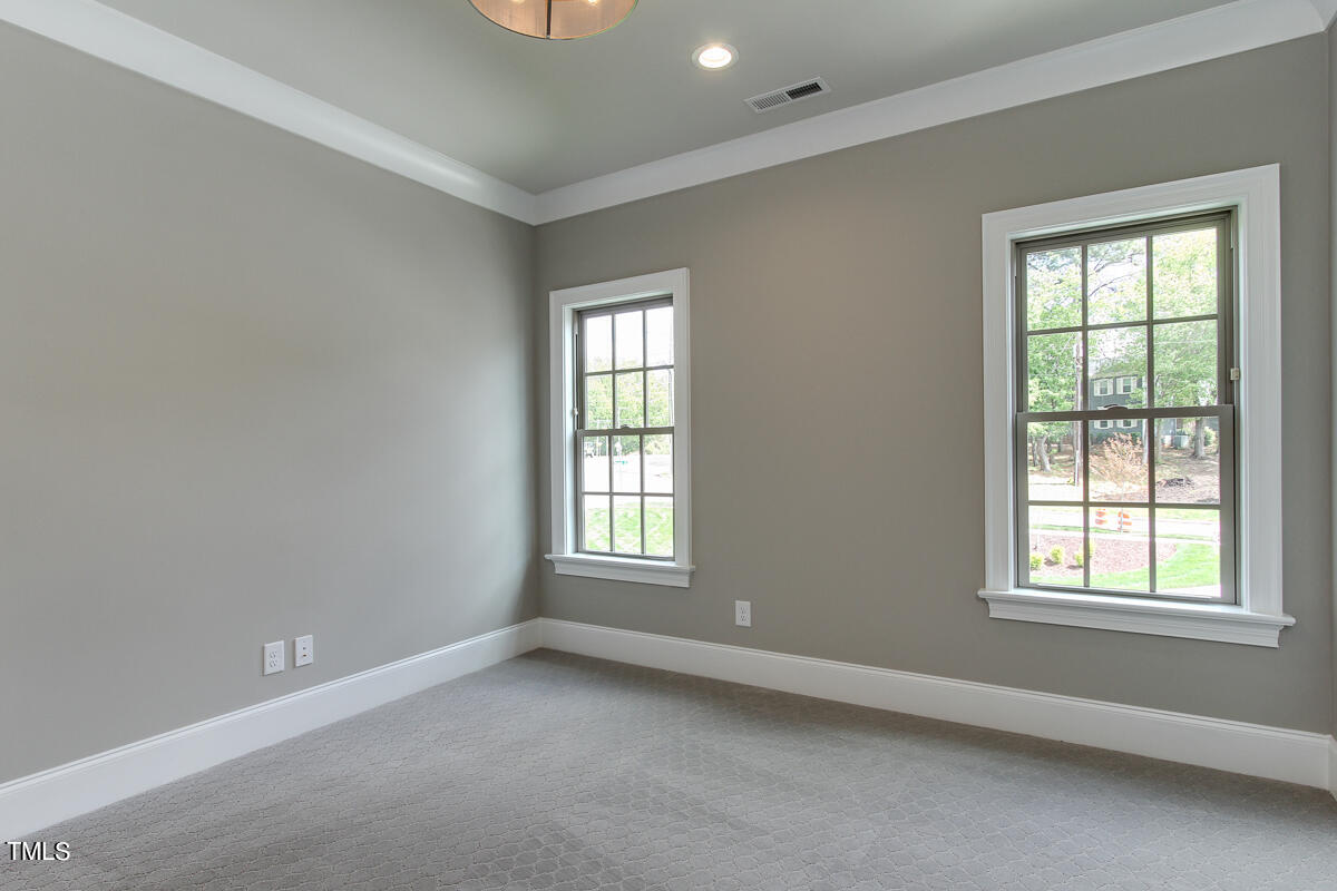 3311 Lake Boone Trail Raleigh, NC 27607 - Photo 18 of 24 an empty room with a window