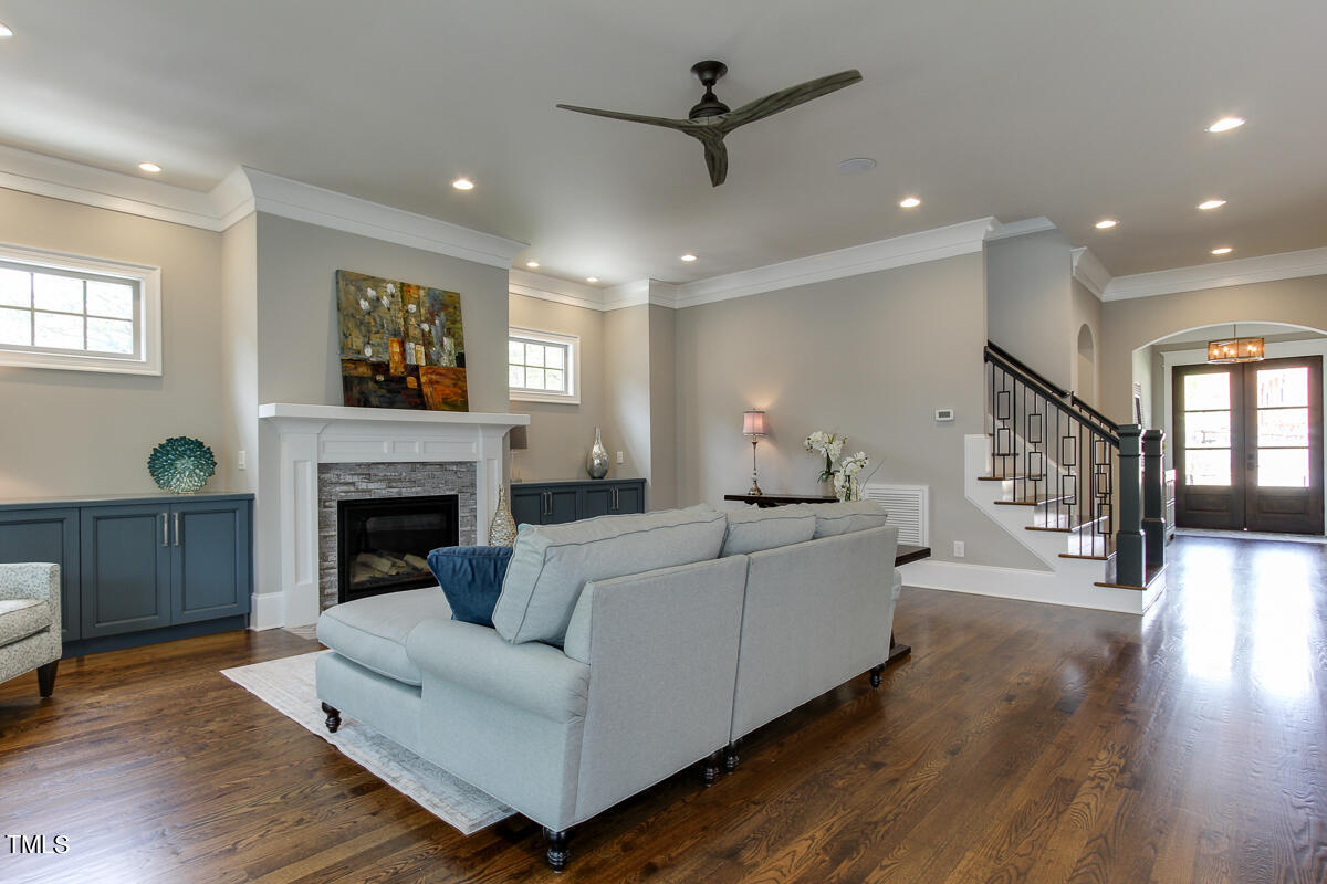 3311 Lake Boone Trail Raleigh, NC 27607 - Photo 4 of 24 a living room with furniture and a fireplace