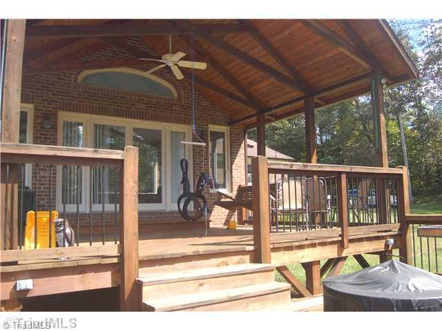 351 Duke Whittaker Road Mocksville, NC 27028 - Photo 3 of 16 Exterior Back. Very nice covered back porch that steps off onto a newly built, very nice deck. Both overlook the pool