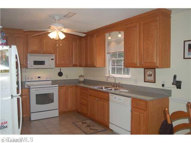 351 Duke Whittaker Road Mocksville, NC 27028 - Photo 9 of 16 Cafeteria/Kitchen. Large kitchen with granite countertops and plenty of cabinet space.
