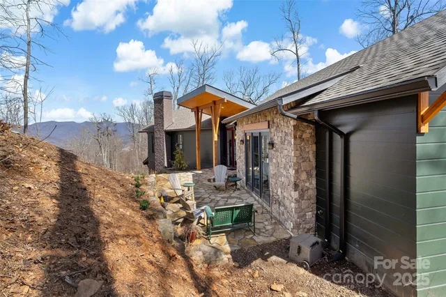 a front view of a house with seating space