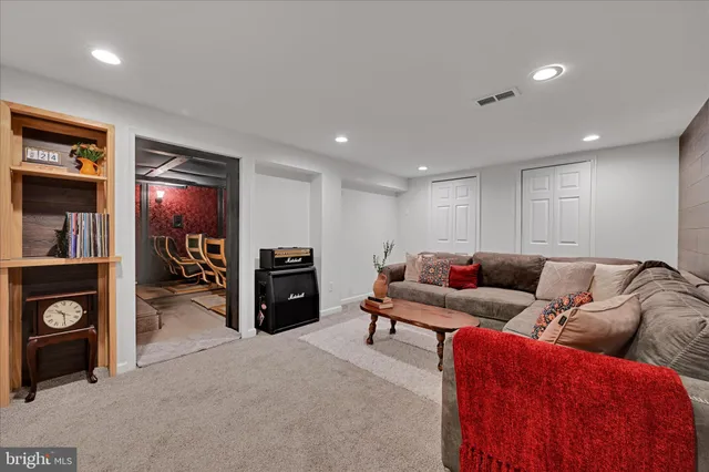 a living room with furniture and a couch