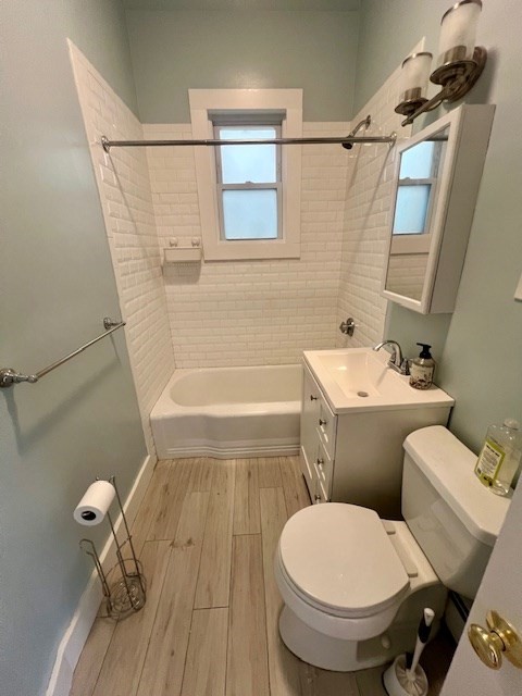 591 Beacon Street, Unit 3 Boston, MA 02215 - Photo 9 of 10 a white toilet sitting next to a bath tub