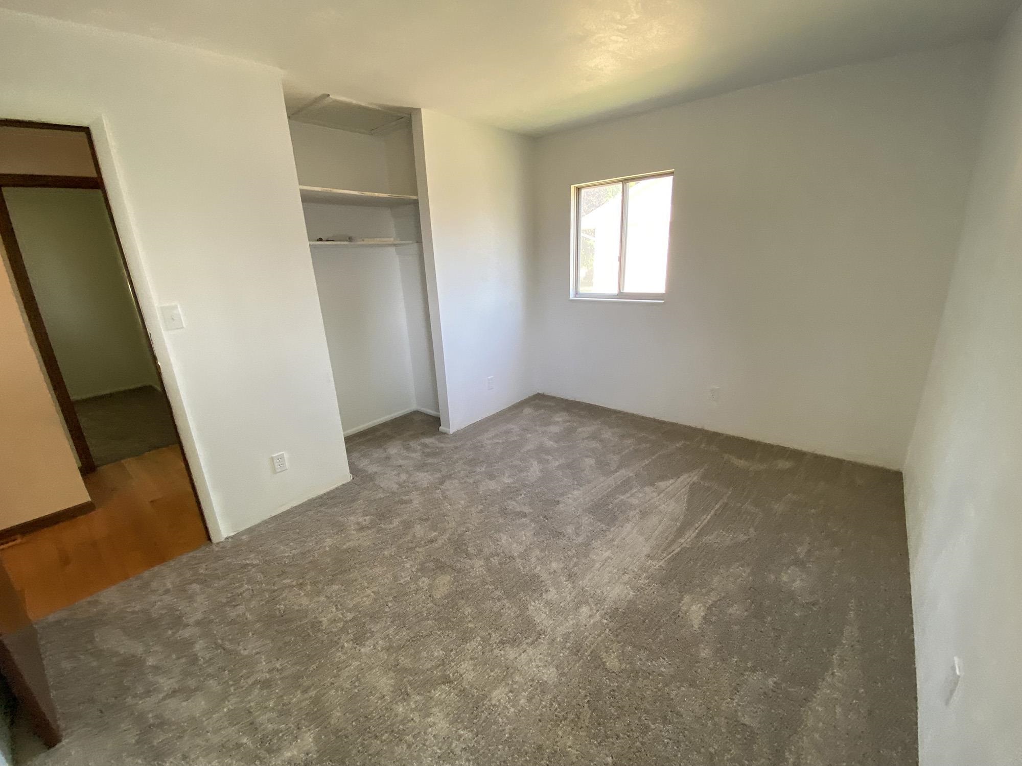 617 South Ridge Street Shannon, IL 61078 - Photo 22 of 30 an empty room with windows