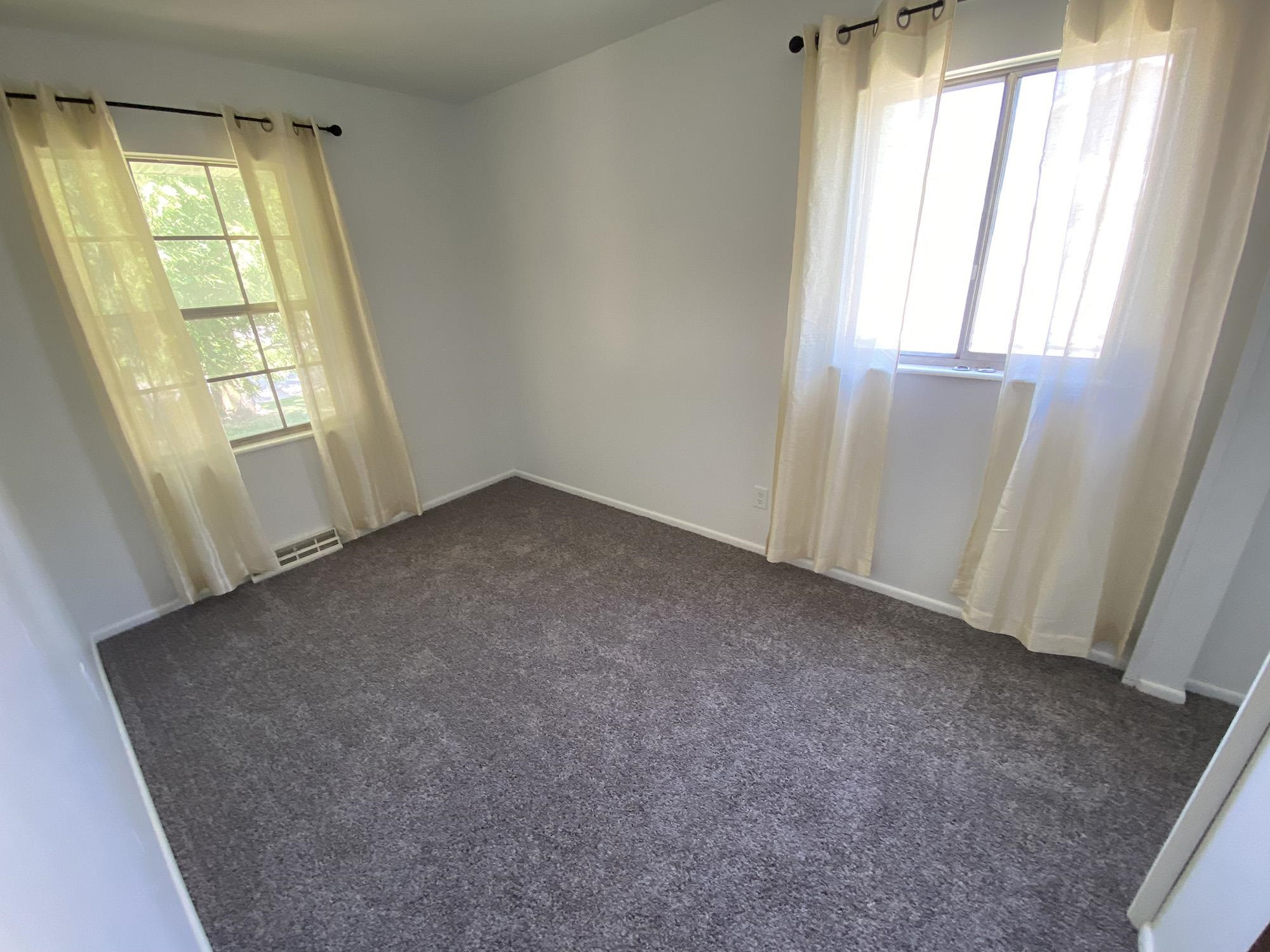 617 South Ridge Street Shannon, IL 61078 - Photo 23 of 30 an empty room with windows