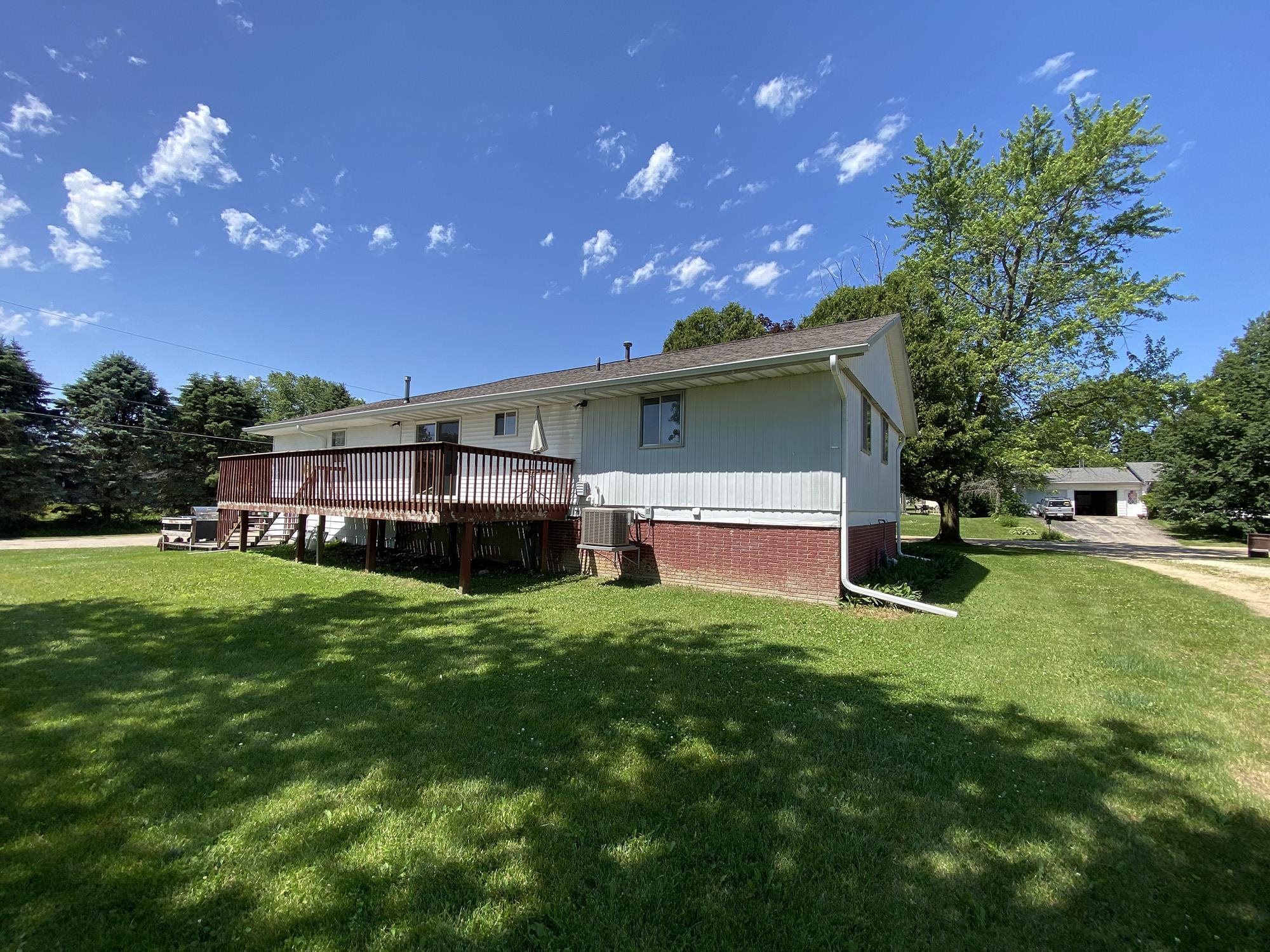 617 South Ridge Street Shannon, IL 61078 - Photo 5 of 30 a house view with a garden space