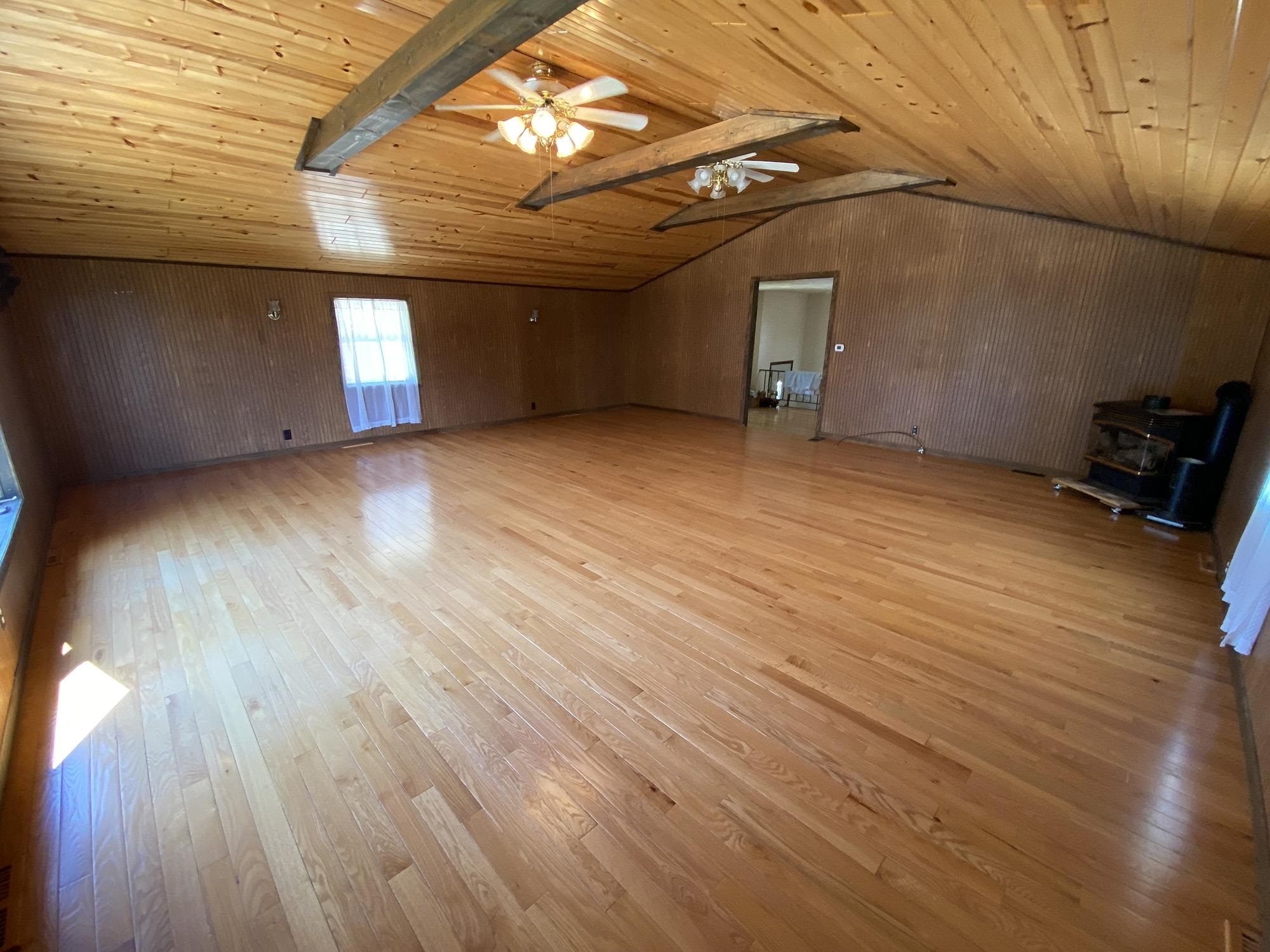 617 South Ridge Street Shannon, IL 61078 - Photo 9 of 30 a view of empty room with wooden floor