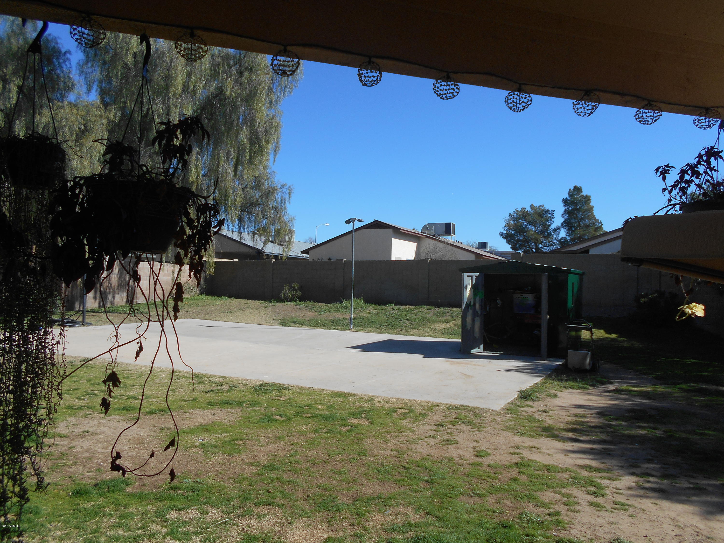 4902 West Tonto Road Glendale, AZ 85308 - Photo 17 of 22 a view of a house with a yard