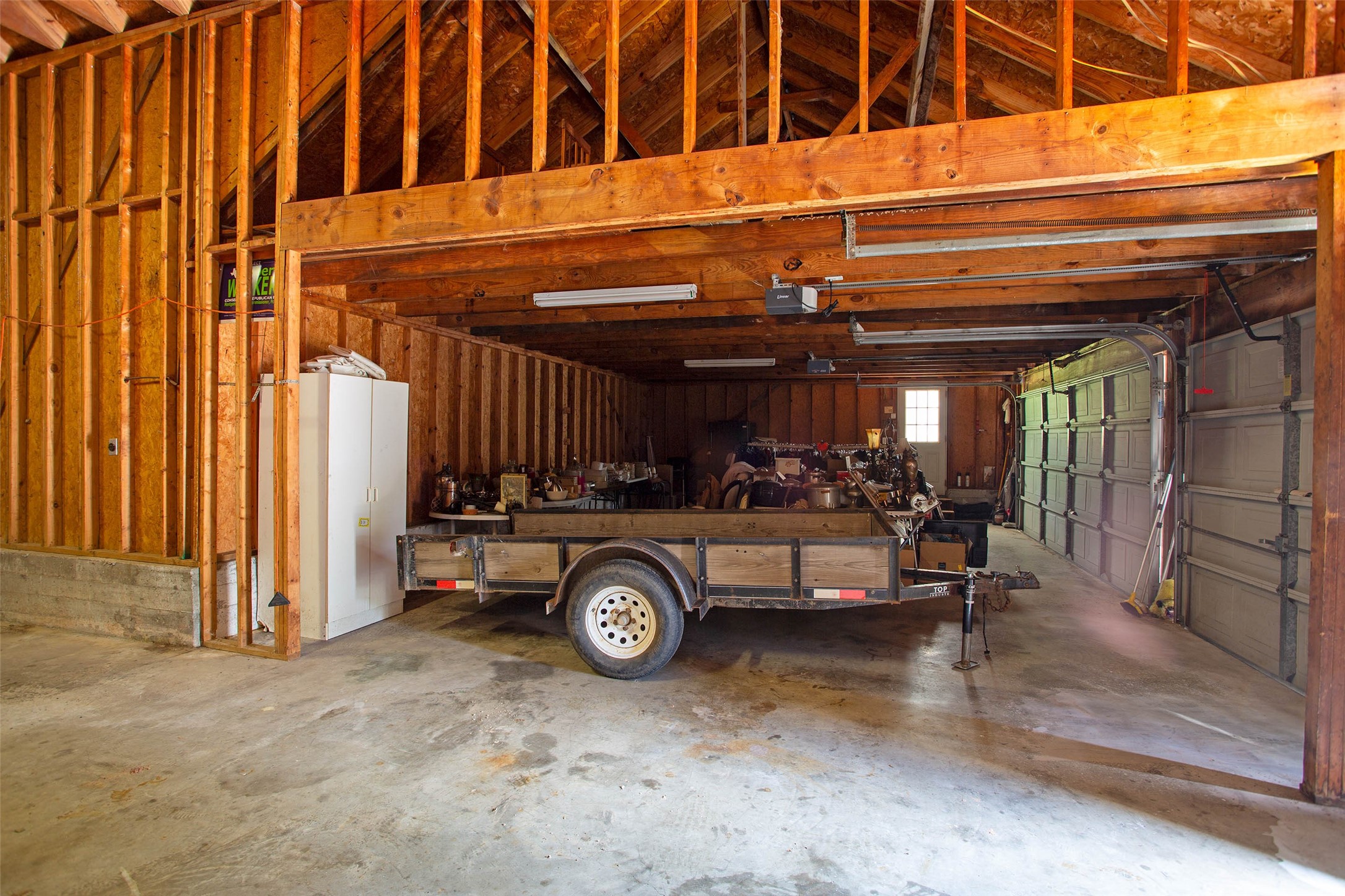 217 Tupelo Lane Conroe, TX 77304 - Photo 22 of 26 Three Space Garage