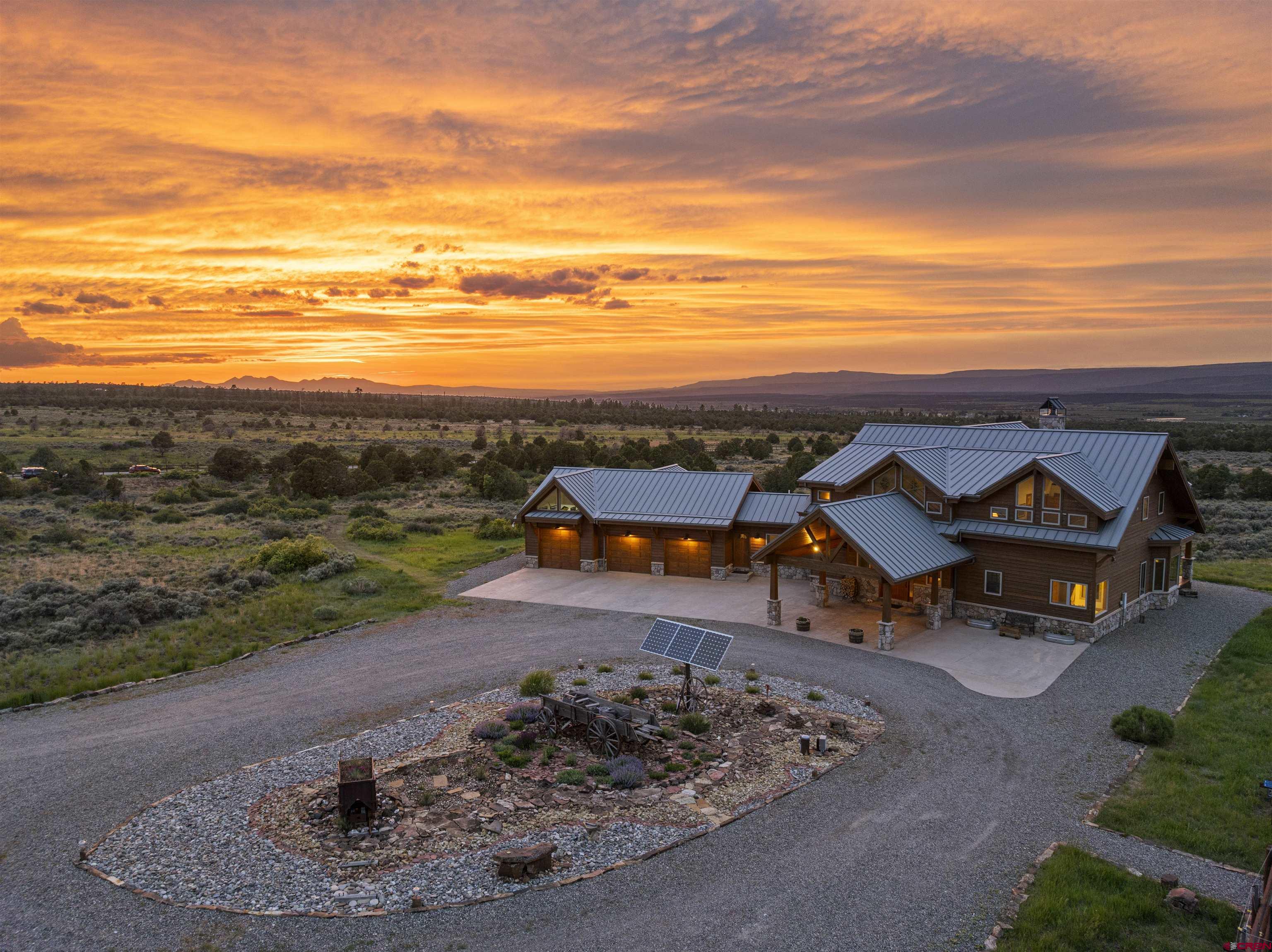 a view of a terrace with a table and chairs