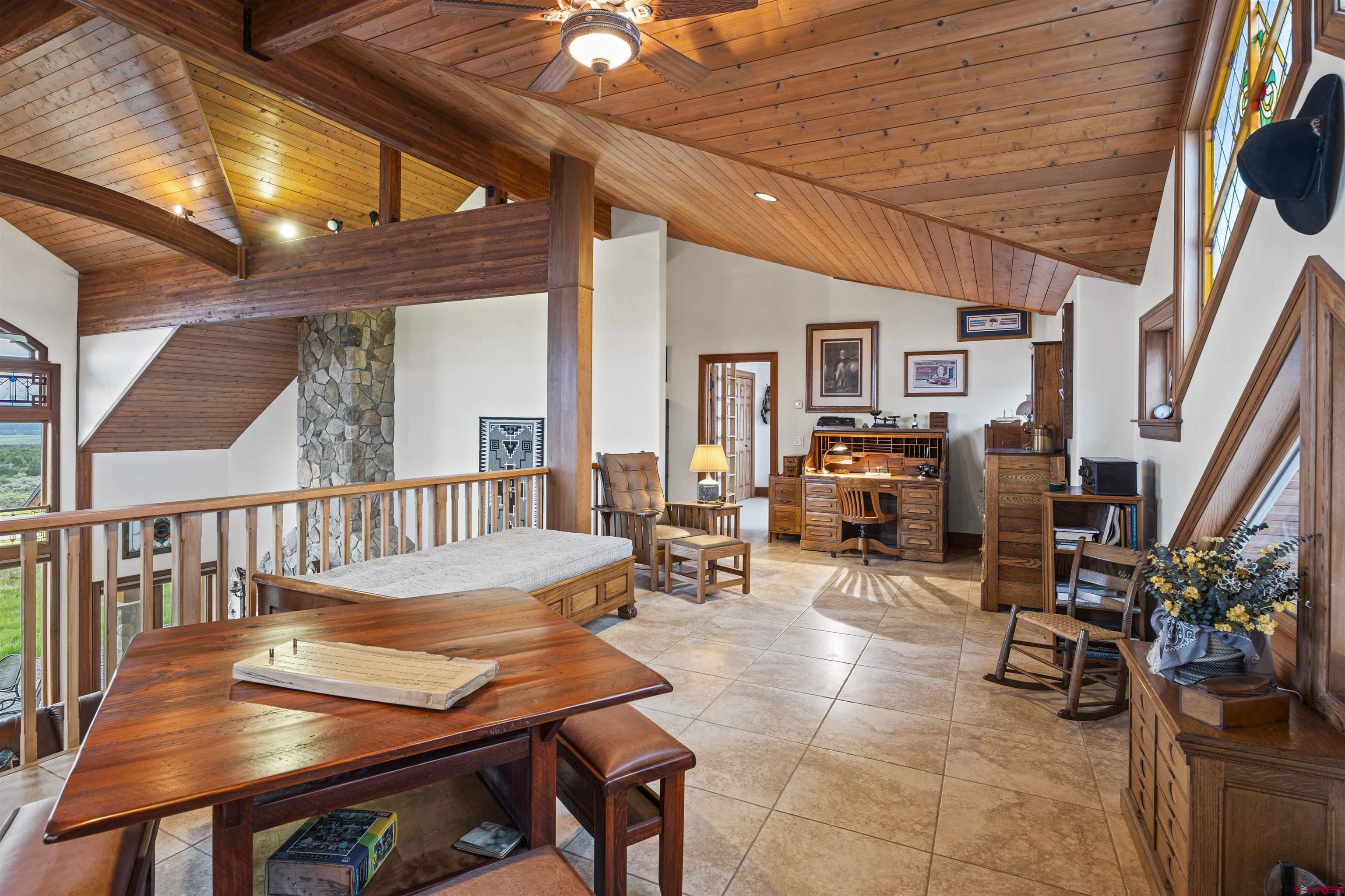 3100 South 44zs Road Norwood, CO 81423 - Photo 25 of 45 a view of a porch with furniture