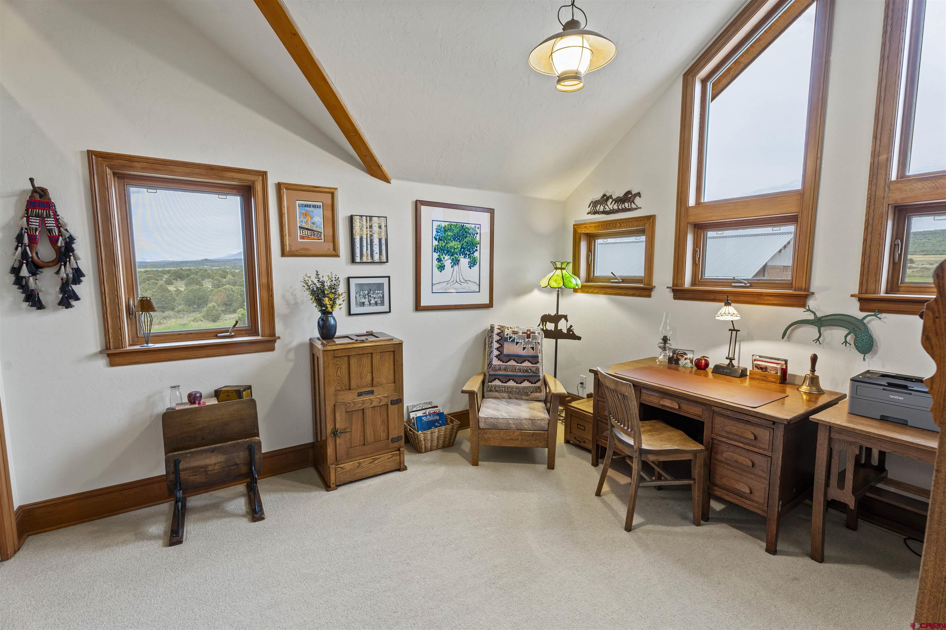 3100 South 44zs Road Norwood, CO 81423 - Photo 28 of 45 a living room with furniture and a window