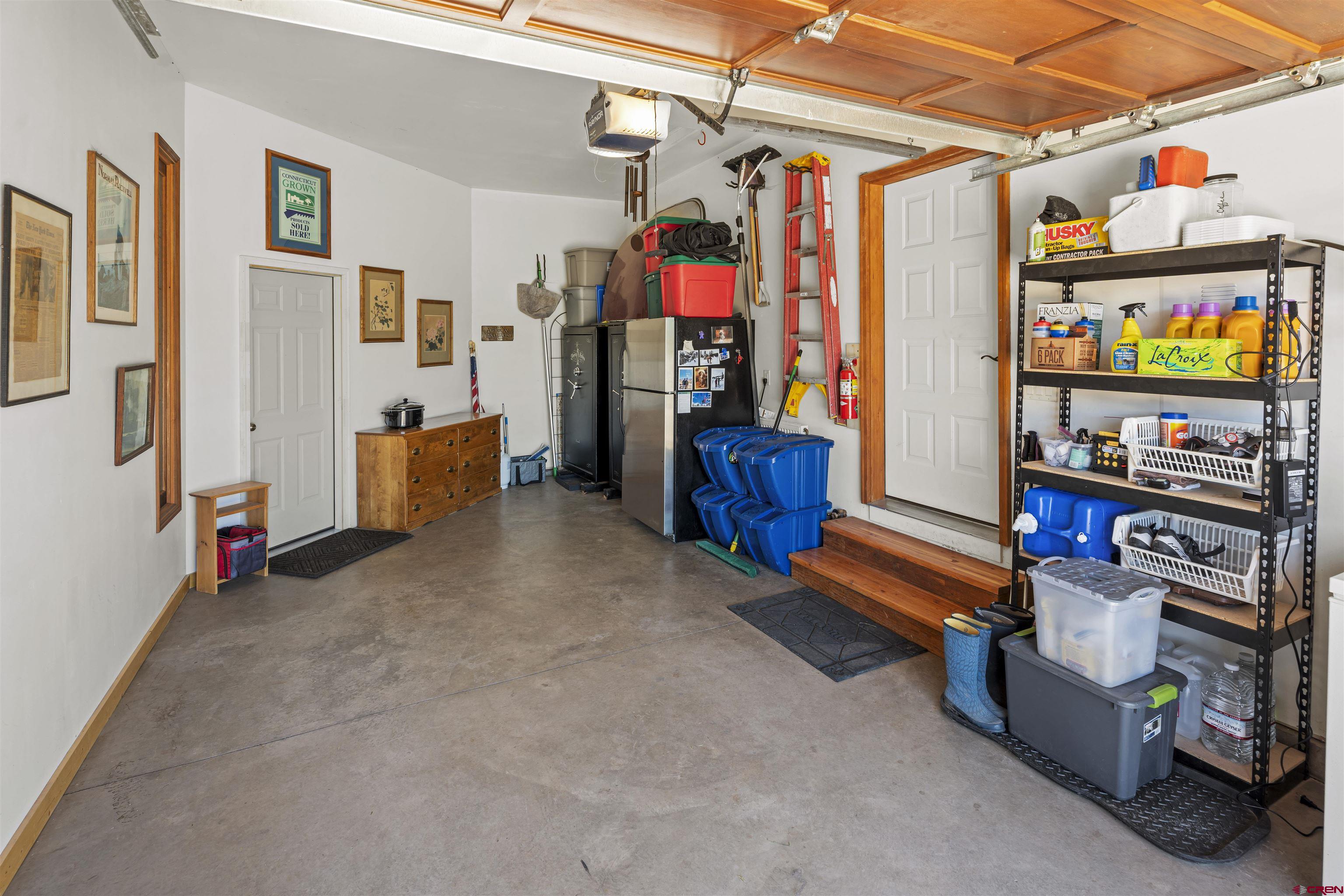 3100 South 44zs Road Norwood, CO 81423 - Photo 39 of 45 a view of store room with clothes and shoes
