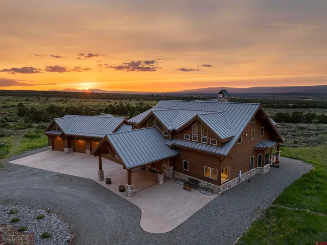 a view of a terrace with sitting area