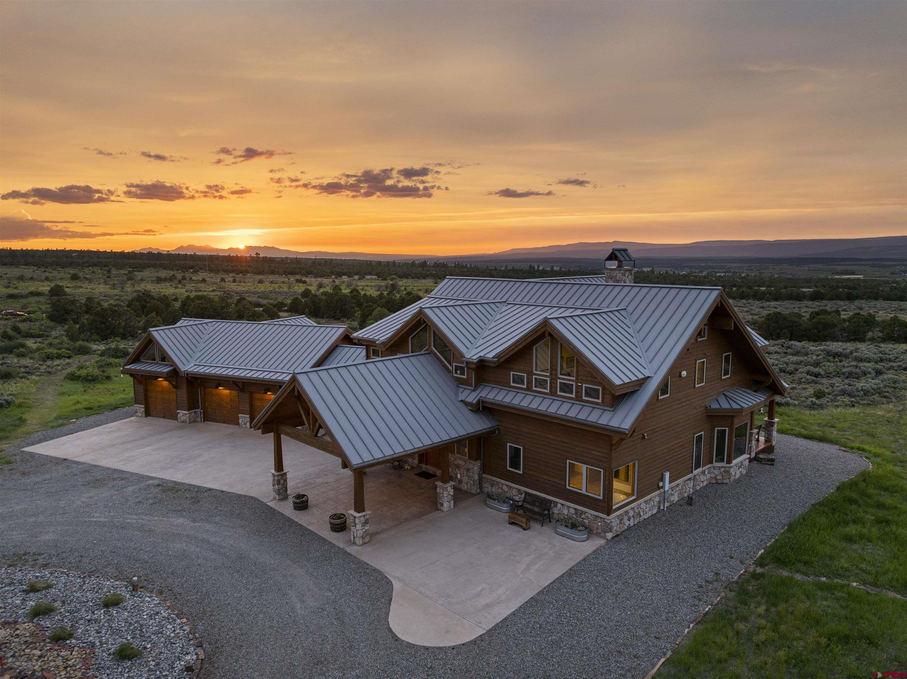 3100 South 44zs Road Norwood, CO 81423 - Photo 4 of 45 a view of a terrace with sitting area