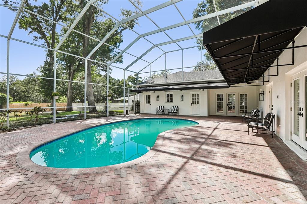 1012 Morfield Lane Brandon, FL 33511 - Photo 85 of 100 a view of a swimming pool with a patio