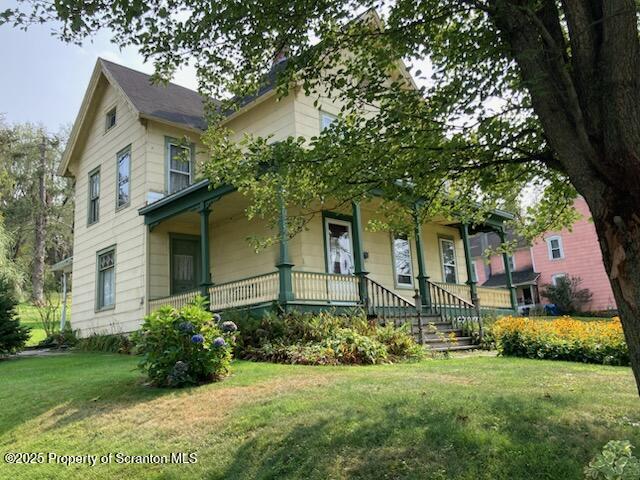 700 West Main Street Susquehanna, PA 18847 - Photo 2 of 43 a front view of a house with a yard
