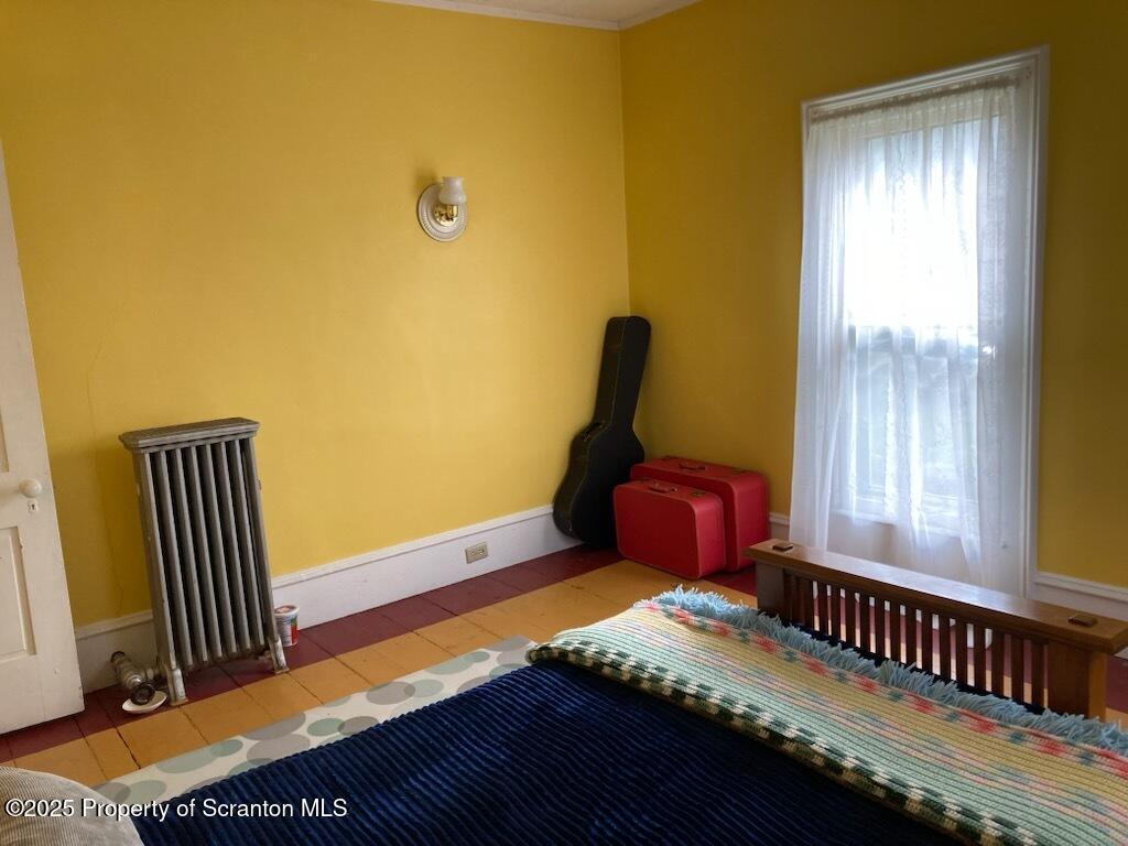 700 West Main Street Susquehanna, PA 18847 - Photo 42 of 43 a bedroom with bed and a window