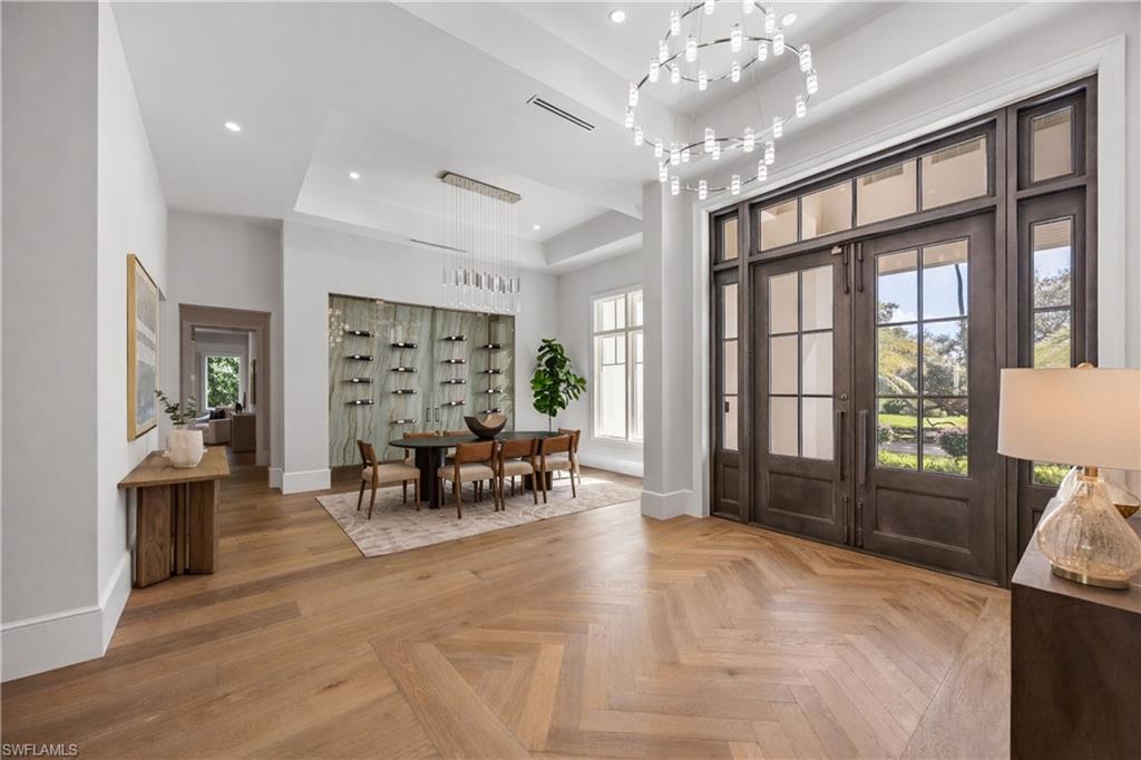 375 Bow Line Drive Naples, FL 34103 - Photo 11 of 48 Virtually Staged Wine Wall