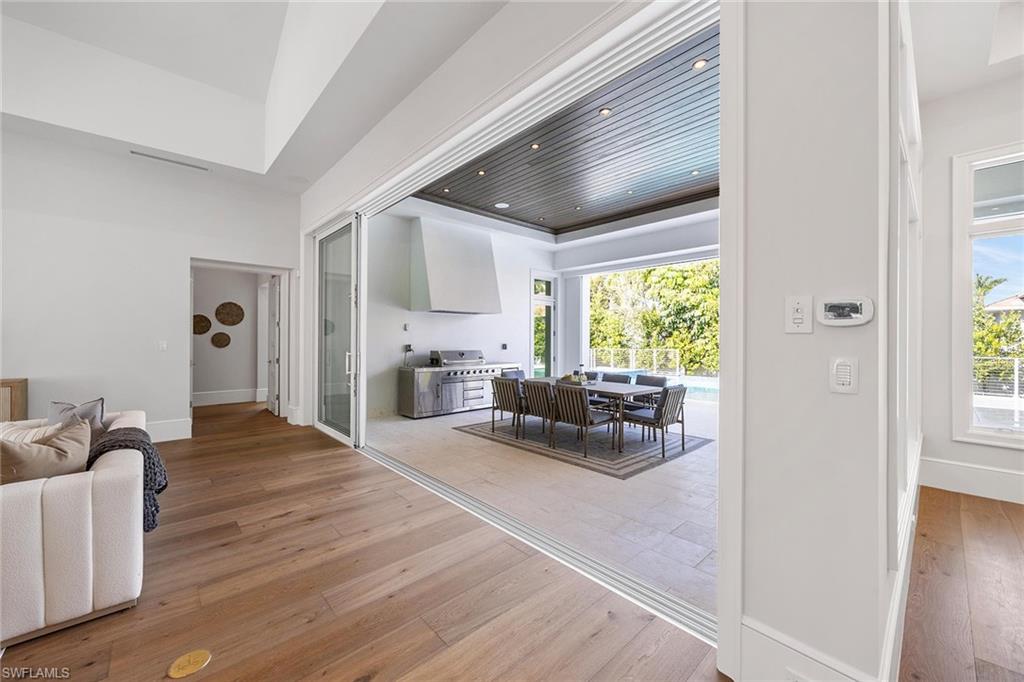 375 Bow Line Drive Naples, FL 34103 - Photo 18 of 50 Outdoor Kitchen & Dining Area